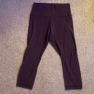 Womens lululemon plum colored 21” align crop
